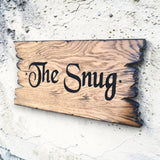 Outdoor rustic wood sign with natural grain