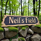 Neil’s Field personalised oak lodge name sign outdoors