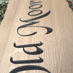 Close up detail of engraved oak lettering texture