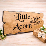 Personalised oak wooden house sign Little Acorn with decorative leaf engraving and gift packaging