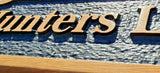Macro detail of engraved lettering and textured black background