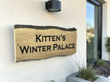 Luxury oak address sign mounted on modern UK home exterior personalised wooden plaque