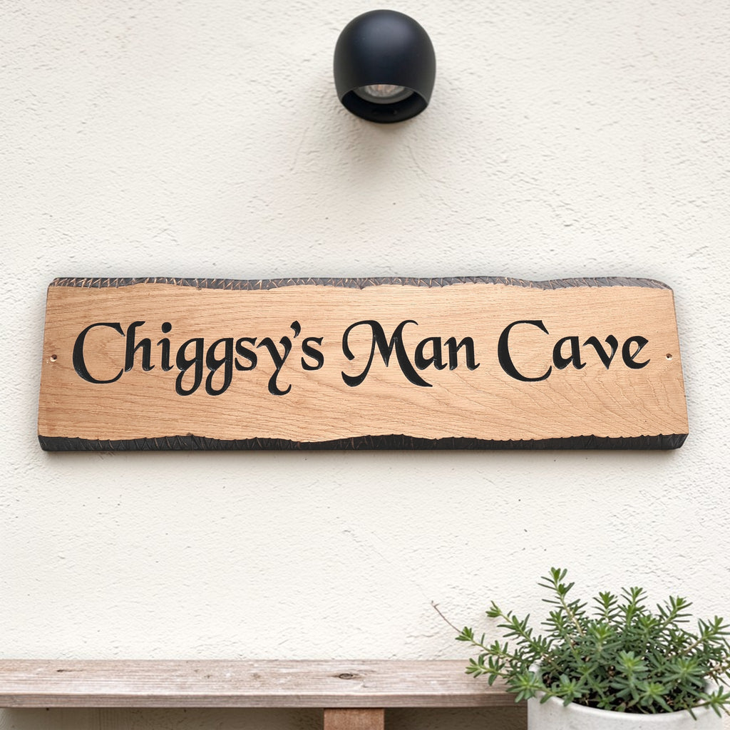 Chiggsy's Man Cave personalised rustic oak sign