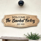 Personalised oak house sign mounted on exterior wall