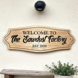 Personalised oak house sign mounted on exterior wall