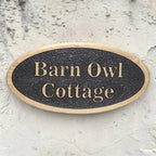 Front view of oval oak outdoor house sign