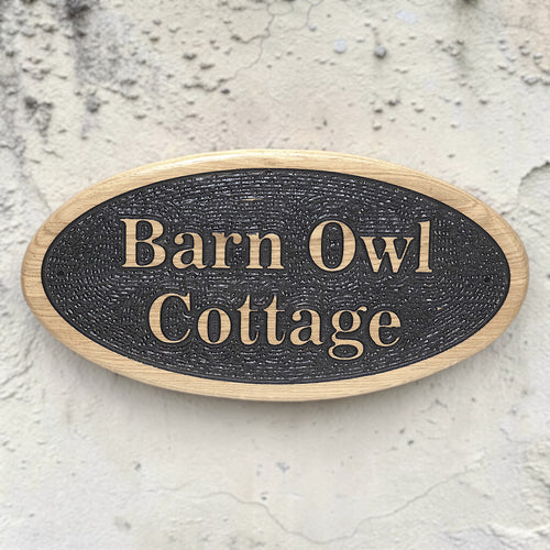 Front view of oval oak outdoor house sign