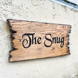 Custom rustic cottage sign engraved on natural wood