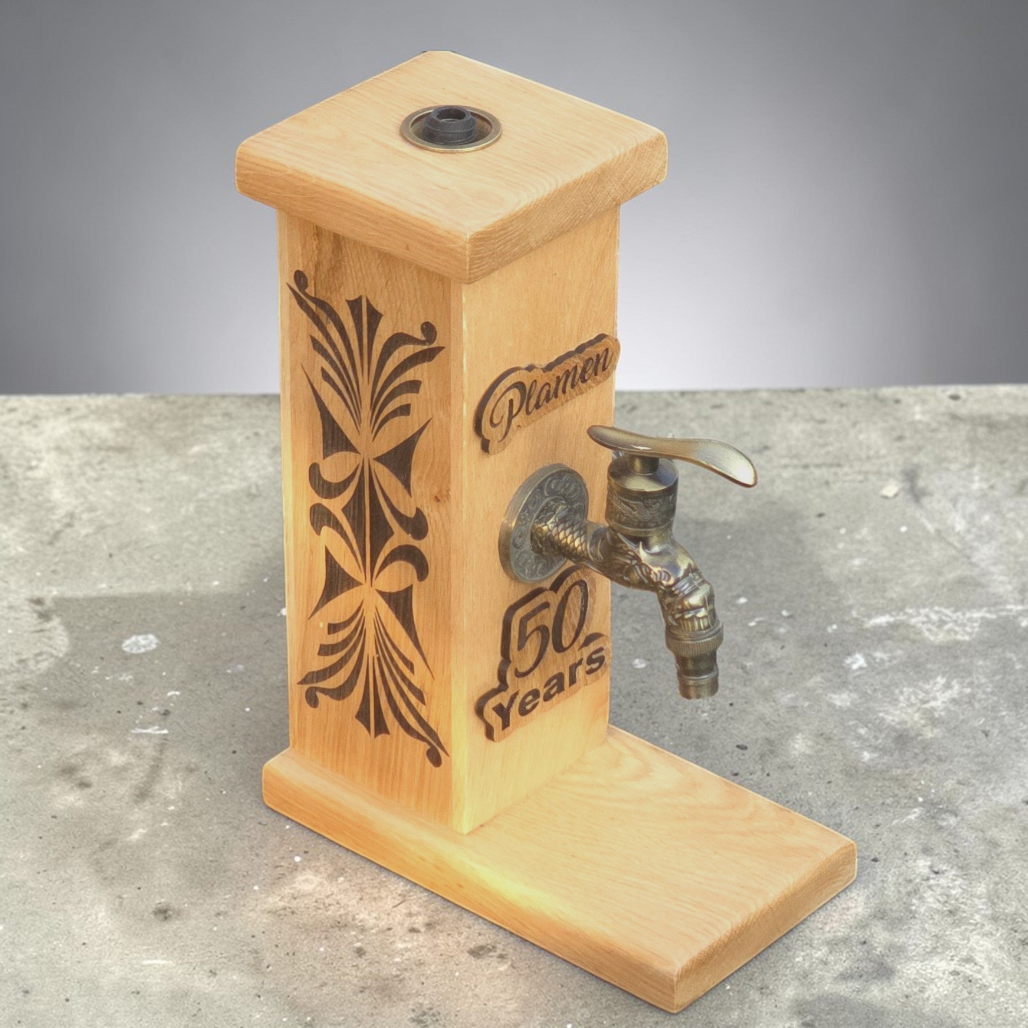 Personalised wooden whiskey dispenser stand with engraved name and brass tap