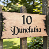 Custom rustic cottage sign engraved on natural wood