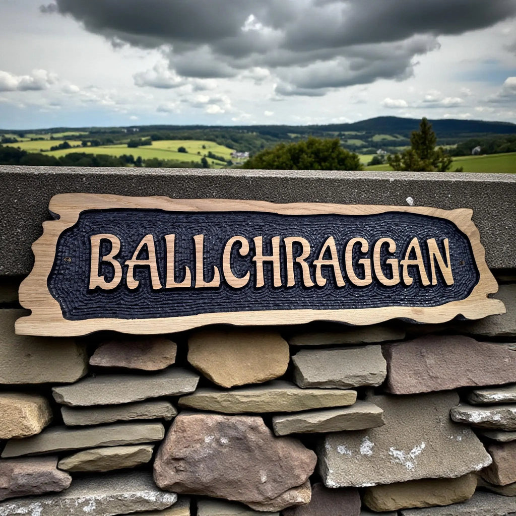 Ballchraggon rustic oak house sign displayed on stone wall