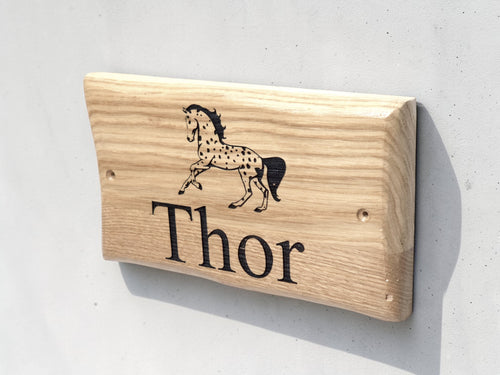 Side view of handcrafted oak dog kennel plaque showing natural wood grain
