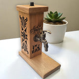 Handcrafted wooden liquor dispenser stand with metal tap